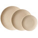 Three beige GET BamboMel round plates.