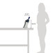 A woman standing next to a stainless steel double wall wine cooler on a table.