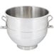 A silver bowl with two handles.