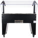A black and silver Advance Tabco buffet table with a clear top.