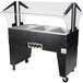 A black Advance Tabco buffet hot food table with a clear top.