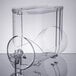 A clear plastic container with a clear lid on a Cecilware Granita Machine.