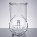 A clear plastic container with a white lid.