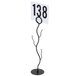 A Tablecraft branch card holder with a black base holding a white sign with black numbers.