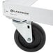 A Lakeside metal sheet pan dolly with black rubber wheels.