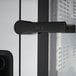 The black handle of a Convotherm combi oven door with a white border.