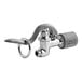 A close-up of the T&S chrome pre-rinse spray valve with a handle and hose.