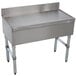 A stainless steel free-standing bar drainboard by Advance Tabco.