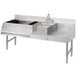 A stainless steel Advance Tabco Uni-Serv speed bar with a sink on the left side.