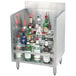 A silver metal cabinet with a shelf of liquor bottles.