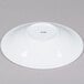 A CAC Super Bright White porcelain bowl with a round bottom.