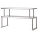 A stainless steel Advance Tabco double overshelf with two shelves on metal legs.