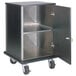 A black and stainless steel Advance Tabco cash register stand with two doors on wheels.