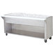 A stainless steel Advance Tabco ice-cooled table with an enclosed base and ice in it.