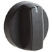 A black plastic replacement knob with a white stripe and a small hole in it.