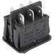 A black Galaxy power switch for meat grinders with three metal terminals.