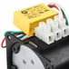 A Grand Slam replacement motor with wires and a yellow connector.