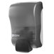 A grey San Jamar manual foam soap dispenser with a black plastic cover.