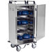 A Lakeside stainless steel meal delivery cart with blue dishes on shelves.