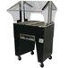 An Advance Tabco stainless steel hot food table with an open base on a counter.