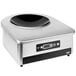 A silver and black square Vollrath countertop induction wok range with a black circle on top.