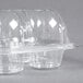 A clear InnoPak cupcake container with high dome lid.