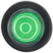 A green light in a black circle.