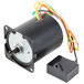 A small black electric motor with colorful wires.