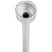 A close-up of a silver metal pump tube with a black hole.