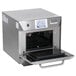 A black Merrychef eikon e4s rapid cook countertop oven with the door open.