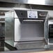 A stainless steel Merrychef eikon e4s countertop oven.