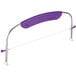 A Wilton small cake leveler with a purple plastic and metal handle.