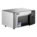 A stainless steel Amana commercial microwave with a black door.