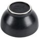 A black china bowl with a white rim.