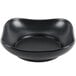 A Hall China black square bowl with scalloped edges.