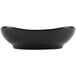 A Hall China black square bowl with scalloped edges.