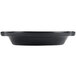 A black round Hall China au gratin dish with a handle.