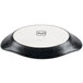 A black and white Hall China rarebit dish with the word "Hall" on it.