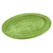 A lime green oval wood underliner with a circular edge.