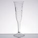 A clear plastic champagne flute with a curved design.