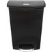 A black plastic Rubbermaid Slim Jim front step-on trash can with a lid.