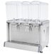 A white Crathco refrigerated beverage dispenser with three clear containers.