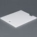 A white square ARY VacMaster filler plate with a hole in it.