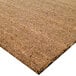 A Cactus Mat natural tan scraper mat with a cocoa brush texture.