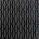 A close up of the black rubber surface of a Cactus Mat Ridge-Scraper safety mat.