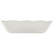 A white rectangular Thunder Group melamine tray with a scalloped edge.