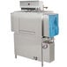A stainless steel Noble Warewashing conveyor dishwasher.