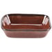 A brown rectangular ceramic dish with a brown rim.