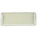 A white rectangular tray with a gold rim.