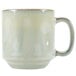 A white Tuxton china mug with a handle.